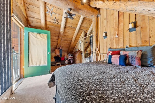 245 Main St, Eagle, CO 81631 - carpeted bedroom with wood ceiling and wooden walls