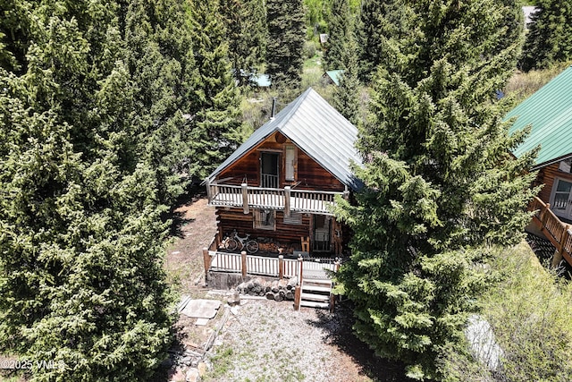245 Main St, Eagle, CO 81631 - rear view of house featuring a wooden deck