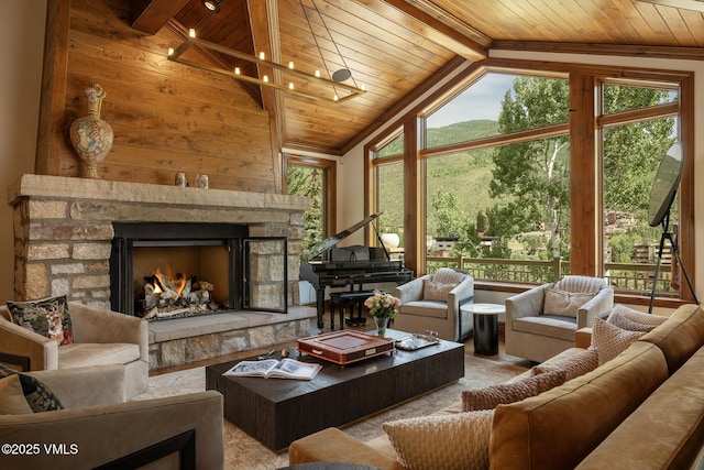 185 Forest Rd Unit A, Vail, CO 81657 - living room with wooden ceiling, healthy amount of natural light, a fireplace, and a mountain view