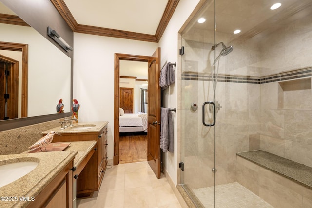 185 Forest Rd Unit A, Vail, CO 81657 - ensuite bathroom with crown molding, two vanities, a shower stall, and recessed lighting