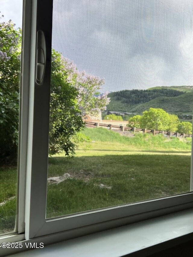 811 W Beaver Creek Blvd Unit D7, Avon, CO 81620 - view of home's community featuring a yard and a view of rural / pastoral area