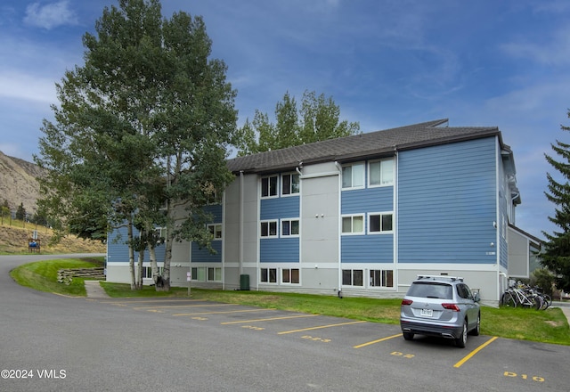 811 W Beaver Creek Blvd Unit D7, Avon, CO 81620 - view of building exterior with uncovered parking