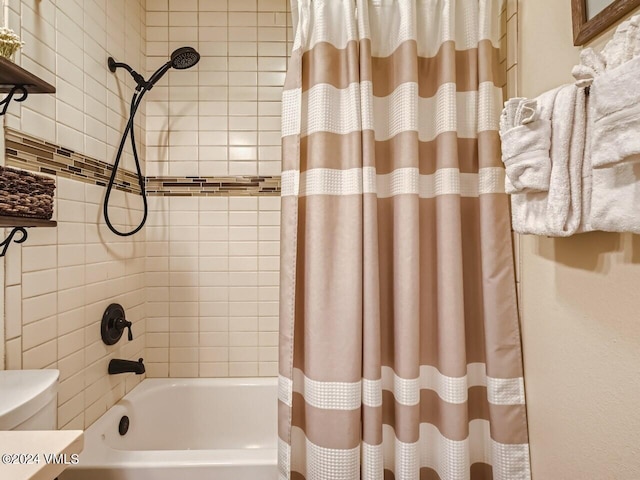 bathroom featuring shower / bath combination with curtain