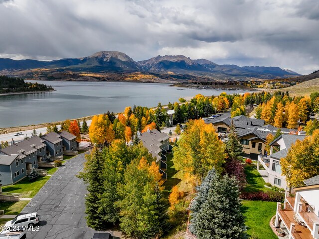 bird's eye view featuring a water and mountain view