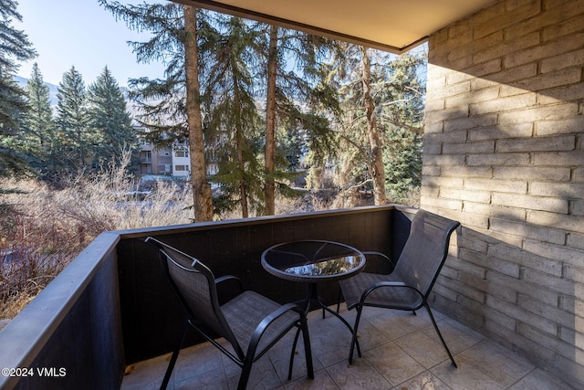 balcony featuring a fire pit