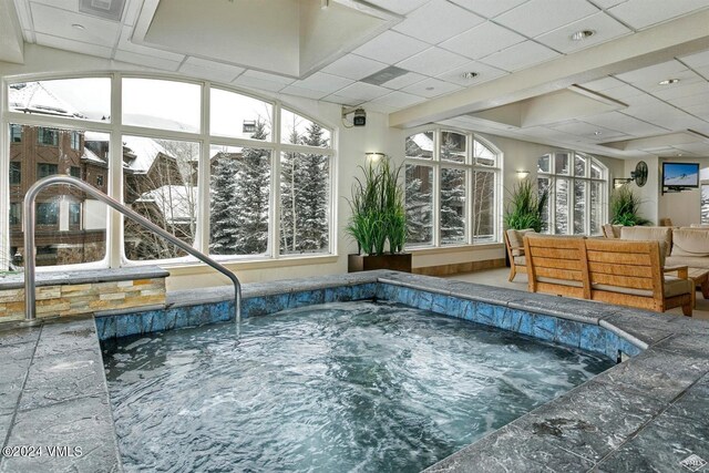 view of pool featuring an indoor hot tub