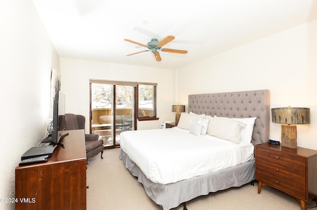 bedroom featuring light carpet, access to outside, and ceiling fan