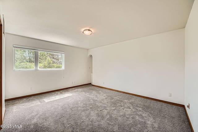 482 Charolais Cir, Edwards, CO 81632 - carpeted spare room featuring arched walkways and baseboards