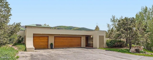 482 Charolais Cir, Edwards, CO 81632 - garage with asphalt driveway