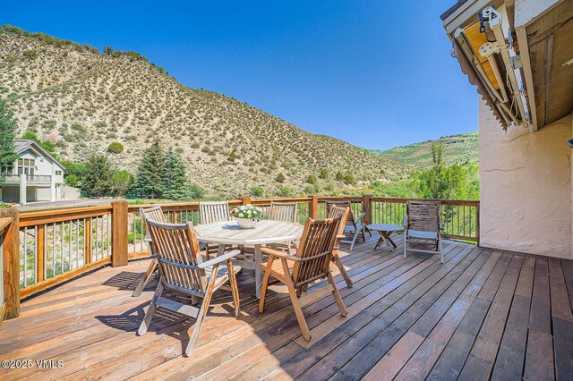 1140 June Creek Rd, Edwards, CO 81632 - deck with outdoor dining space and a mountain view