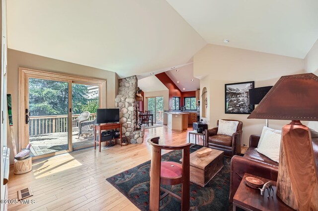 1140 June Creek Rd, Edwards, CO 81632 - living room featuring lofted ceiling and hardwood / wood-style flooring