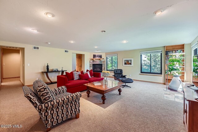 1140 June Creek Rd, Edwards, CO 81632 - carpeted living room with a tile fireplace and recessed lighting