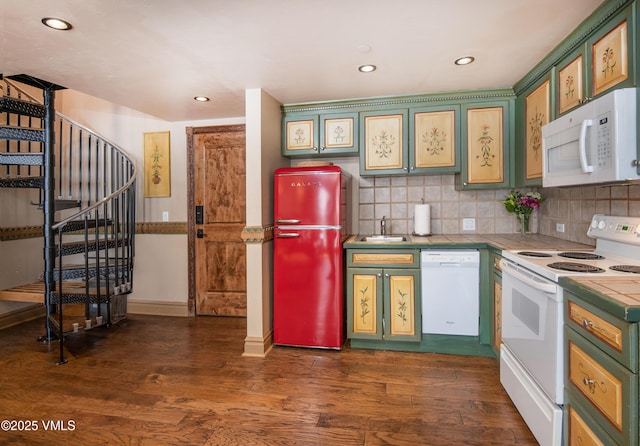 225 Wall St Unit 303, Vail, CO 81657 - kitchen featuring white appliances, green cabinets, tile countertops, dark wood-style flooring, and recessed lighting
