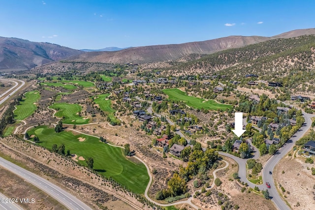 drone / aerial view featuring a mountain view