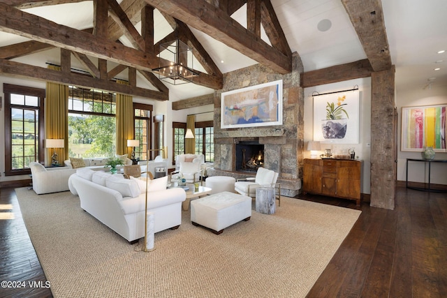 living room with beam ceiling, wood-type flooring, a stone fireplace, and high vaulted ceiling