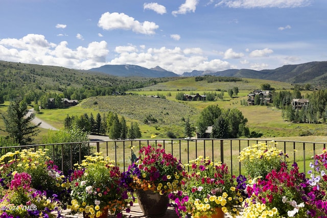 view of mountain feature with a rural view