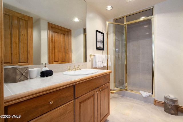 full bath with tile patterned flooring, a shower stall, vanity, and recessed lighting