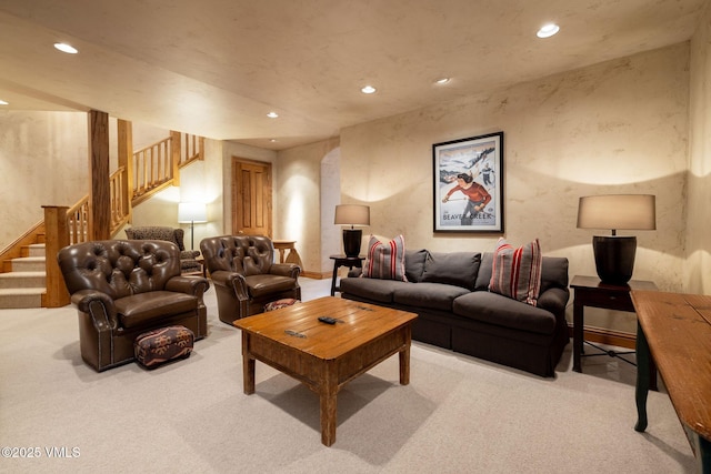 living room featuring light carpet, stairway, and recessed lighting