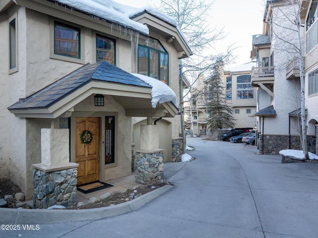 exterior space with stucco siding