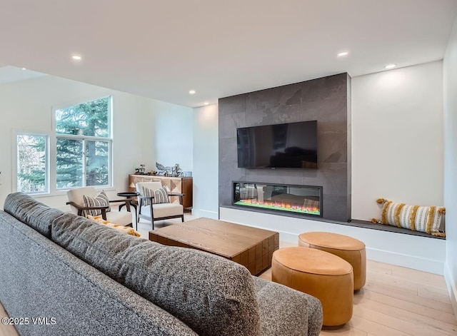1000 Homestead Dr Unit 7, Edwards, CO 81632 - living area with recessed lighting, wood finished floors, a fireplace, and baseboards