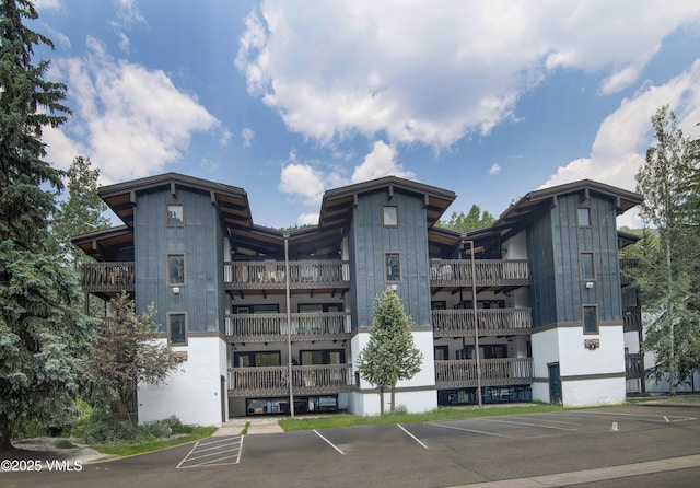 4610 Vail Racquet Club Dr Unit 7-12, Vail, CO 81657 - view of building exterior featuring uncovered parking