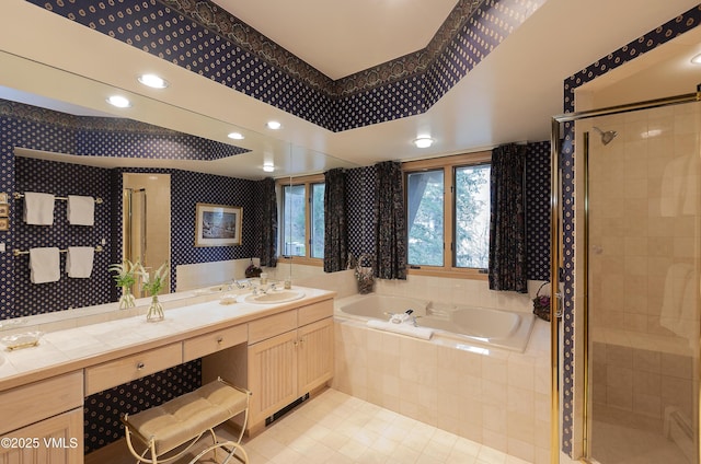 111 Scott Hill Rd Unit 17, Beaver Creek, CO 81620 - full bathroom featuring a stall shower, a bath, vanity, tile patterned flooring, and wallpapered walls