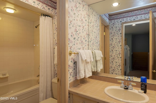 111 Scott Hill Rd Unit 17, Beaver Creek, CO 81620 - bathroom featuring wallpapered walls, shower / tub combo, vanity, toilet, and recessed lighting