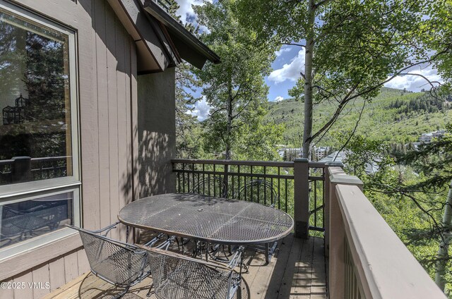 111 Scott Hill Rd Unit 17, Beaver Creek, CO 81620 - living room featuring a chandelier, high vaulted ceiling, carpet flooring, and beamed ceiling