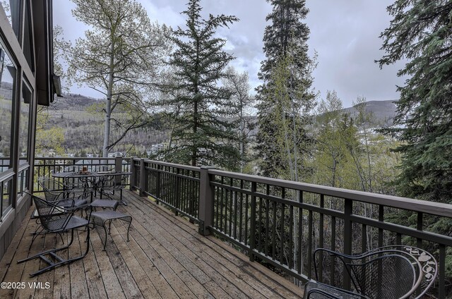 111 Scott Hill Rd Unit 17, Beaver Creek, CO 81620 - carpeted living area with a chandelier, high vaulted ceiling, and beamed ceiling