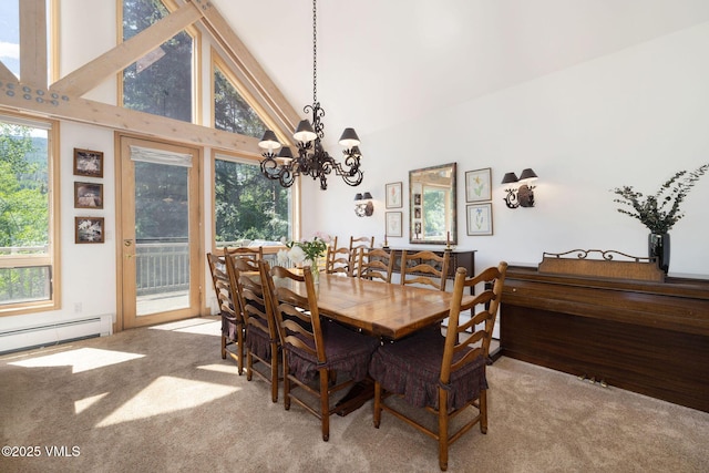 111 Scott Hill Rd Unit 17, Beaver Creek, CO 81620 - carpeted dining room featuring baseboard heating, a chandelier, and high vaulted ceiling