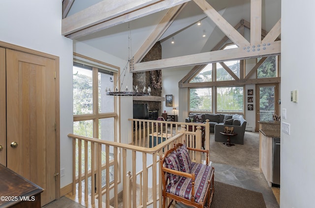 111 Scott Hill Rd Unit 17, Beaver Creek, CO 81620 - hallway featuring high vaulted ceiling, beamed ceiling, and healthy amount of natural light