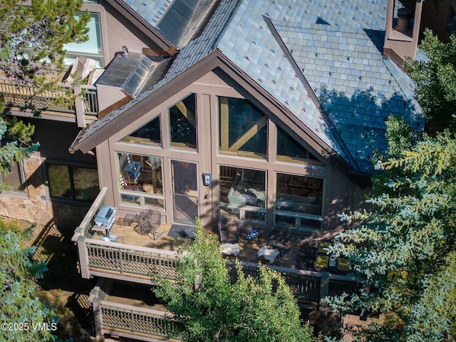 111 Scott Hill Rd Unit 17, Beaver Creek, CO 81620 - rear view of property with a sunroom