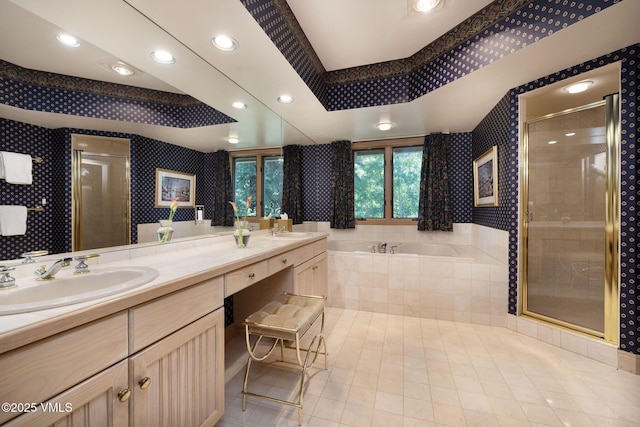 111 Scott Hill Rd Unit 17, Beaver Creek, CO 81620 - bathroom with wallpapered walls, a stall shower, double vanity, a bath, and tile patterned flooring