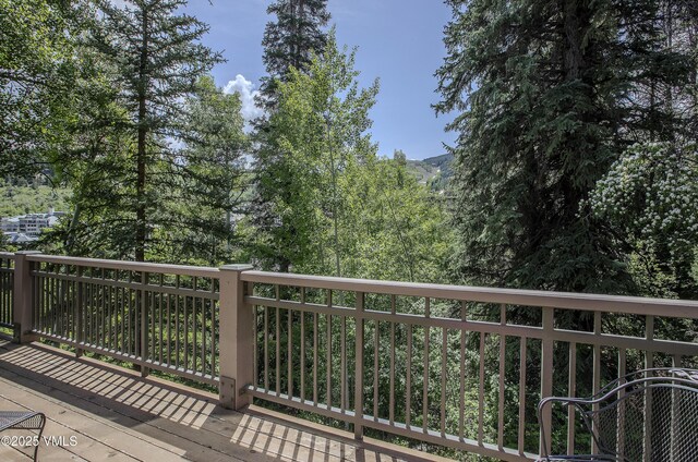 111 Scott Hill Rd Unit 17, Beaver Creek, CO 81620 - water view with a mountain backdrop and a heavily wooded area