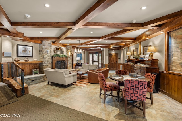 311 Offerson Rd Unit 223, Beaver Creek, CO 81620 - dining room featuring beam ceiling, a stone fireplace, coffered ceiling, recessed lighting, and wood walls