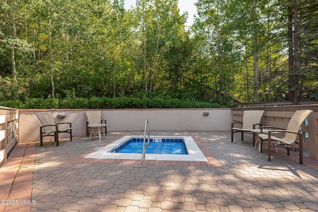 311 Offerson Rd Unit 223, Beaver Creek, CO 81620 - view of swimming pool with a patio area and an in-ground hot tub