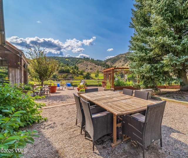 view of patio / terrace featuring a mountain view