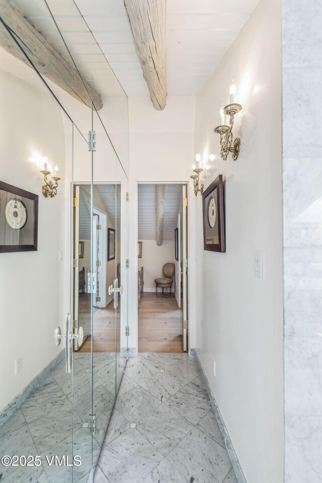 hallway with beamed ceiling and wooden ceiling