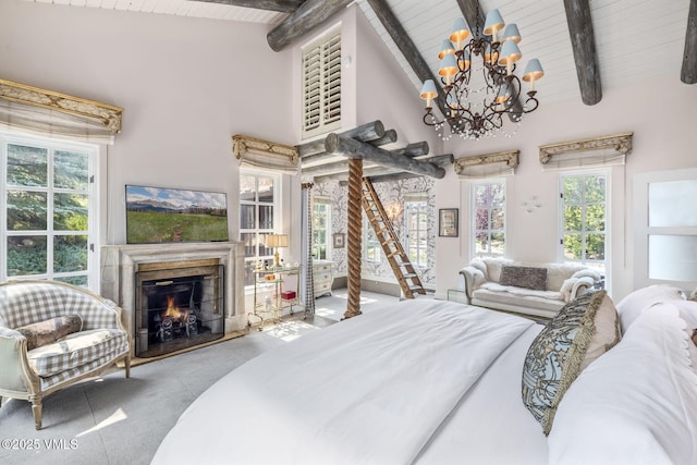 bedroom featuring wood ceiling, beam ceiling, a chandelier, and high vaulted ceiling