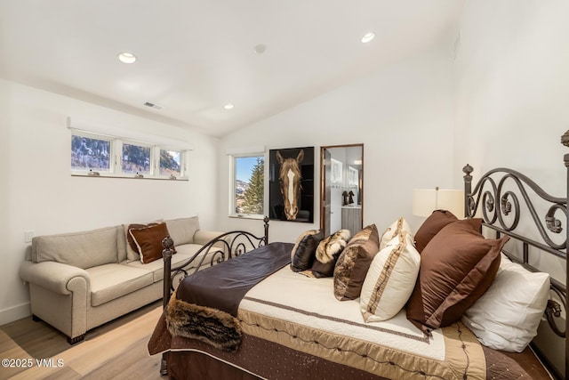 3235 Katsos Ranch Rd, Vail, CO 81657 - bedroom with wood finished floors, vaulted ceiling, and recessed lighting