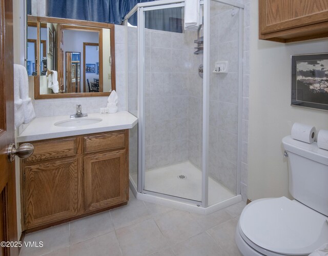 760 W Beaver Creek Blvd Unit 115, Avon, CO 81620 - bathroom featuring vanity, tile patterned floors, and a stall shower