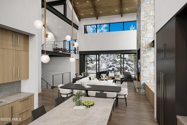 46 Red Spruce Ln Unit 2, Beaver Creek, CO 81620 - dining space with high vaulted ceiling, dark wood-type flooring, a wooden ceiling with exposed beams, and recessed lighting