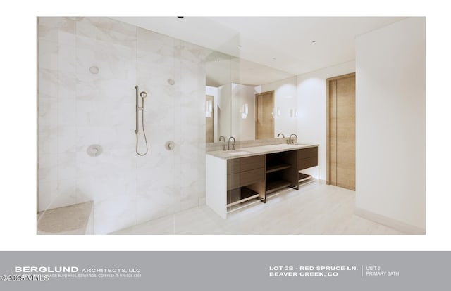 46 Red Spruce Ln Unit 2, Beaver Creek, CO 81620 - bathroom featuring a walk in shower, double vanity, and tile patterned flooring