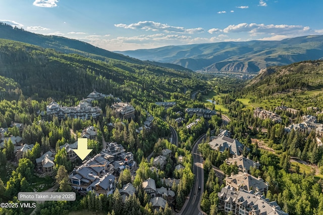 46 Red Spruce Ln Unit 2, Beaver Creek, CO 81620 - aerial view of property and surrounding area featuring a mountain backdrop and nearby suburban area