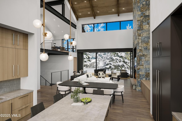 46 Red Spruce Ln Unit 2, Beaver Creek, CO 81620 - dining space with high vaulted ceiling, dark wood-style flooring, recessed lighting, and a wood ceiling with exposed beams