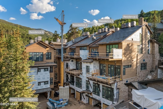 46 Red Spruce Ln Unit 2, Beaver Creek, CO 81620 - view of building exterior featuring a mountain view