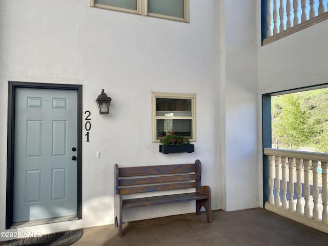 34323 US Highway 6 Unit R-201, Edwards, CO 81632 - property entrance featuring stucco siding and a balcony