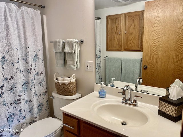 34323 US Highway 6 Unit R-201, Edwards, CO 81632 - bathroom featuring vanity, toilet, and curtained shower