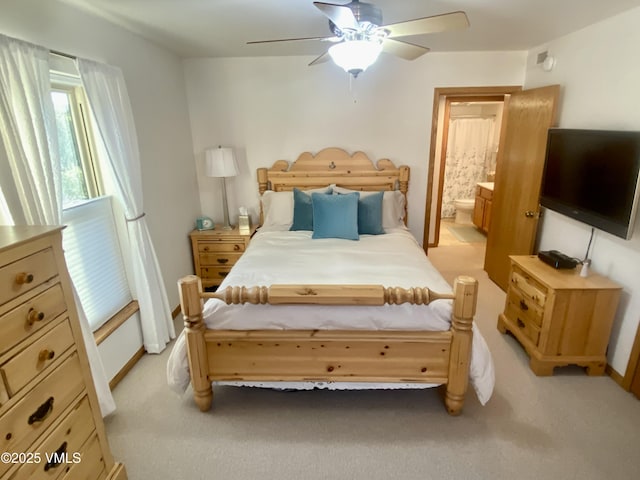 34323 US Highway 6 Unit R-201, Edwards, CO 81632 - bedroom featuring light colored carpet, ensuite bathroom, and ceiling fan