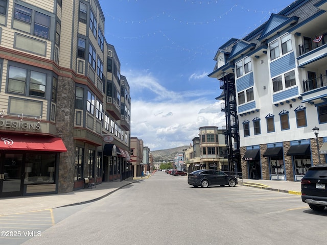 34323 US Highway 6 Unit R-201, Edwards, CO 81632 - view of asphalt road featuring curbs, street lights, and sidewalks